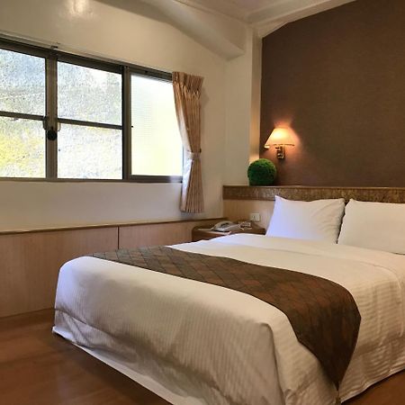 Minren Hotel Yuchi Extérieur photo