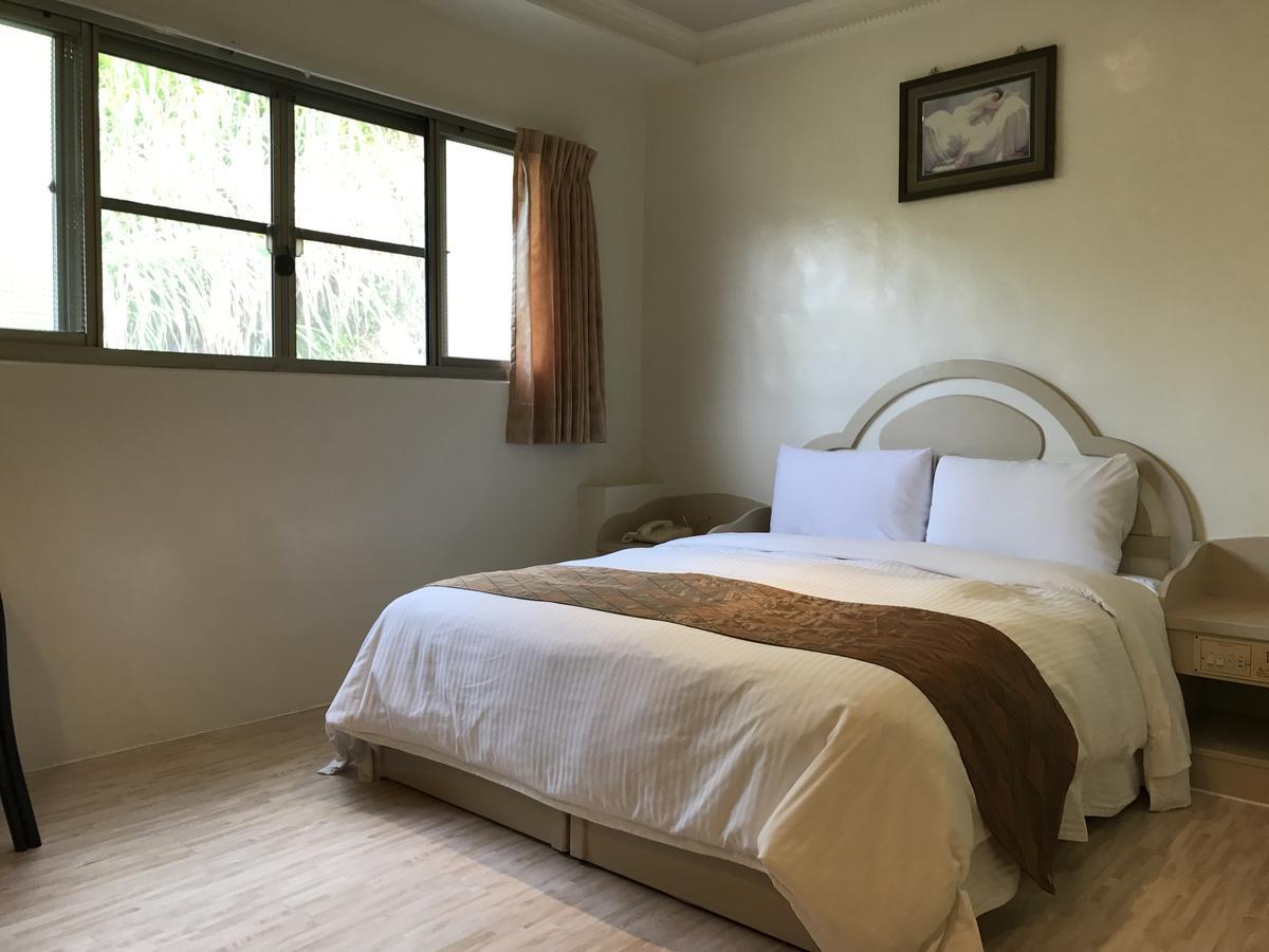Minren Hotel Yuchi Extérieur photo