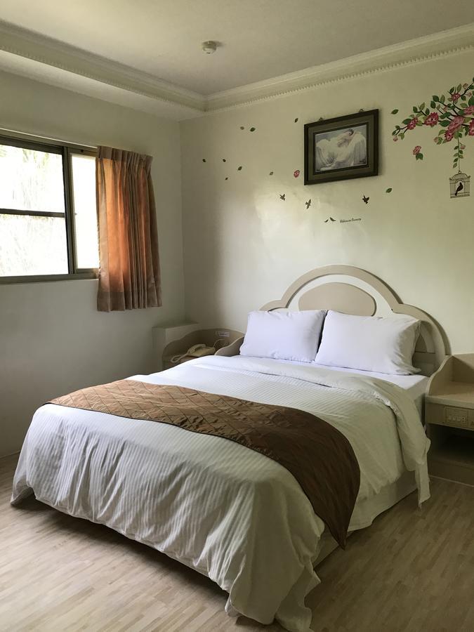 Minren Hotel Yuchi Extérieur photo