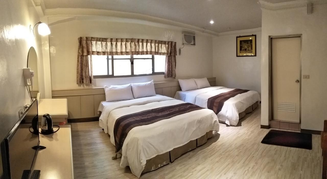 Minren Hotel Yuchi Chambre photo
